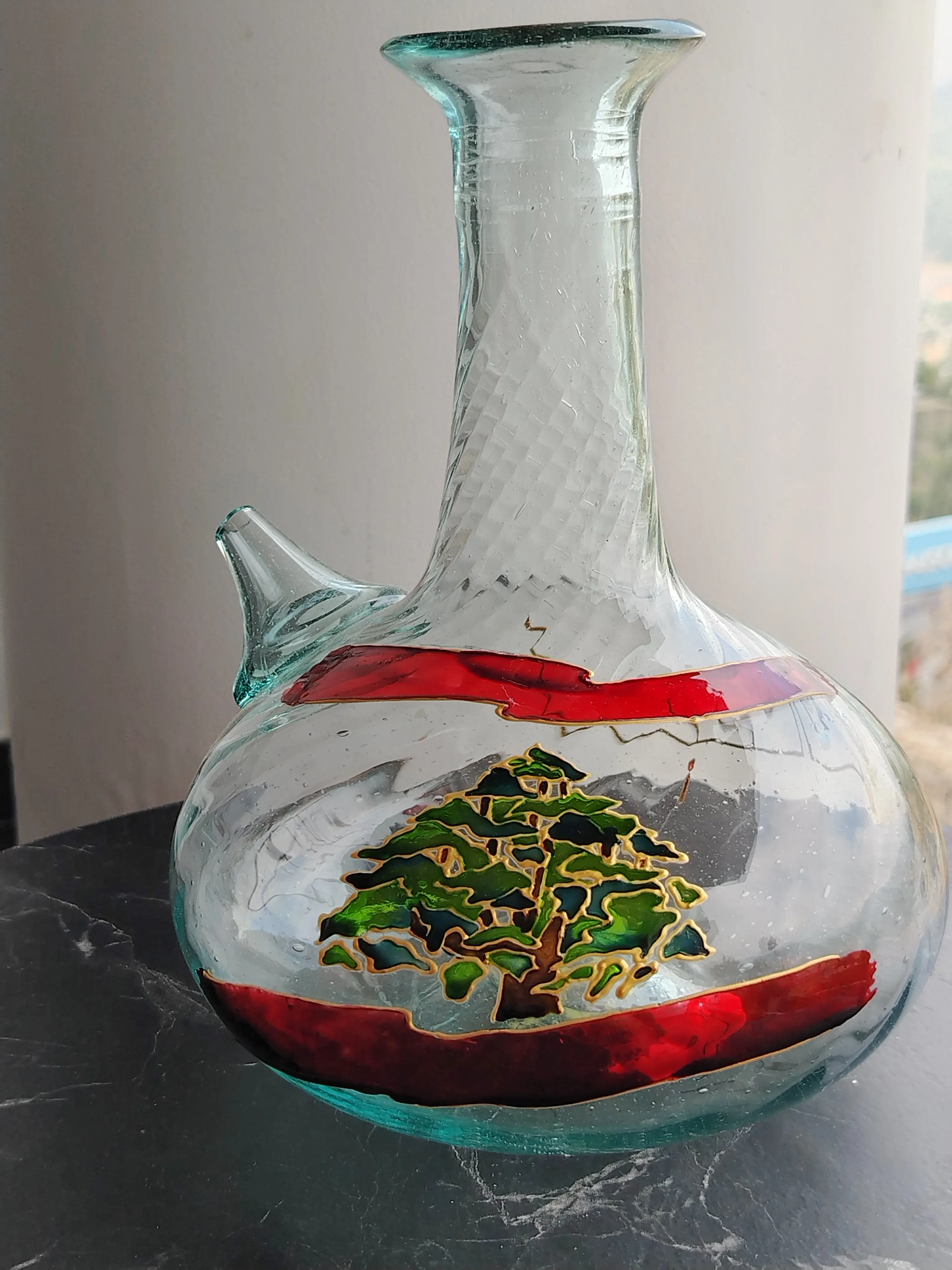 Hand-painted glass jug with the Lebanese cedar and flag motif, ready for delivery